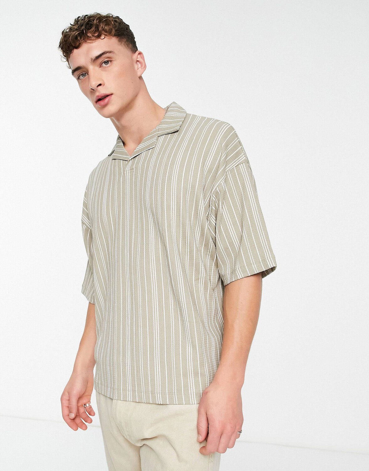 

Oversize-футболка поло в полоску с ребристым воротником ASOS DESIGN