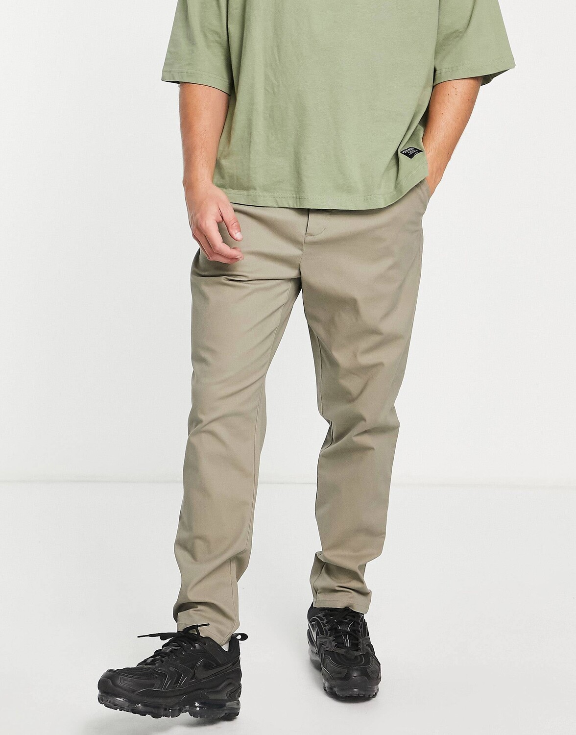 

Зауженные брюки чинос цвета хаки ASOS DESIGN