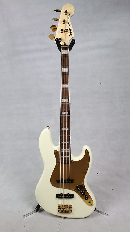 Squier 40th Anniversary Jazz Bass Gold Edition Laurel Fingerboard Gold Anodized Pickguard White 40th Anniversary Jazz Bass, Gold Edition