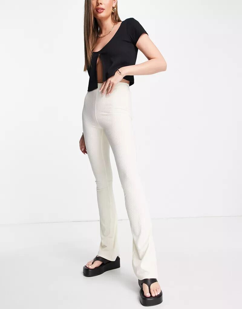 

Бежевые расклешенные брюки скинни в рубчик Topshop