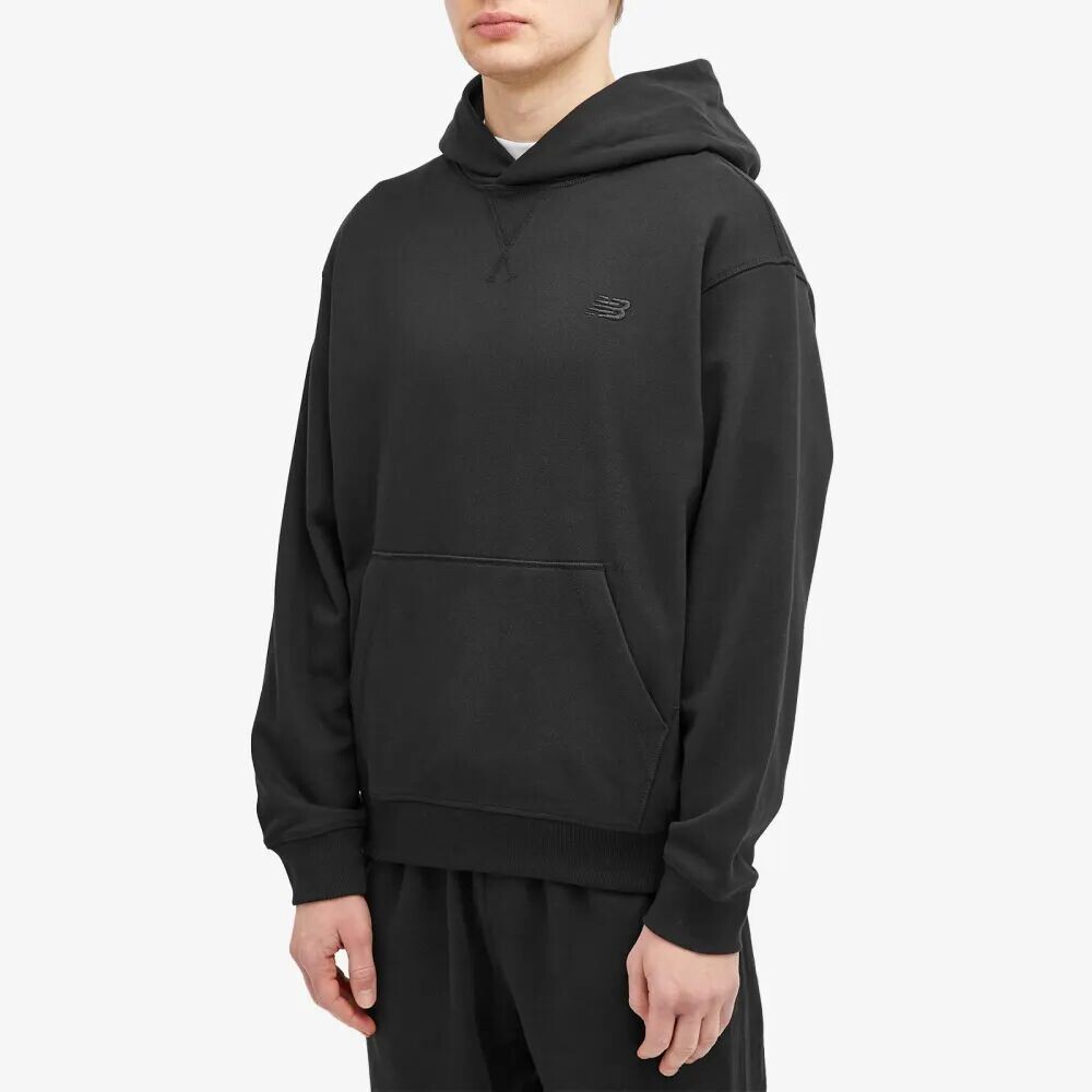 

New Balance Толстовка NB Athletics из французского терри, черный