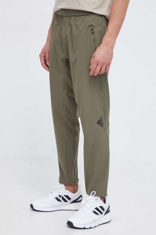 Спортивные брюки , созданные для тренировок adidas, зеленый фотографии