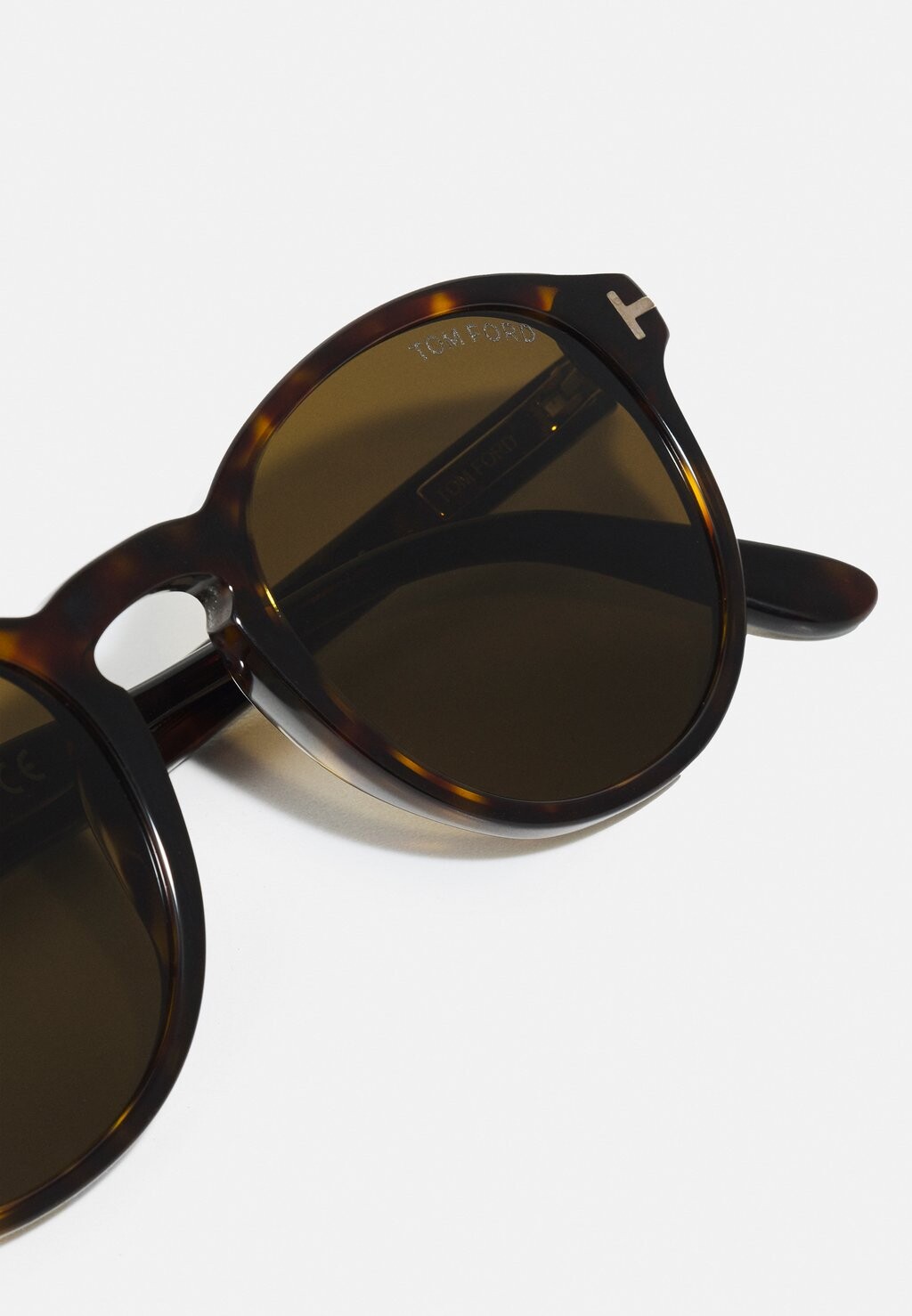 

Солнцезащитные очки Unisex Tom Ford, темные гавана/ровиекс