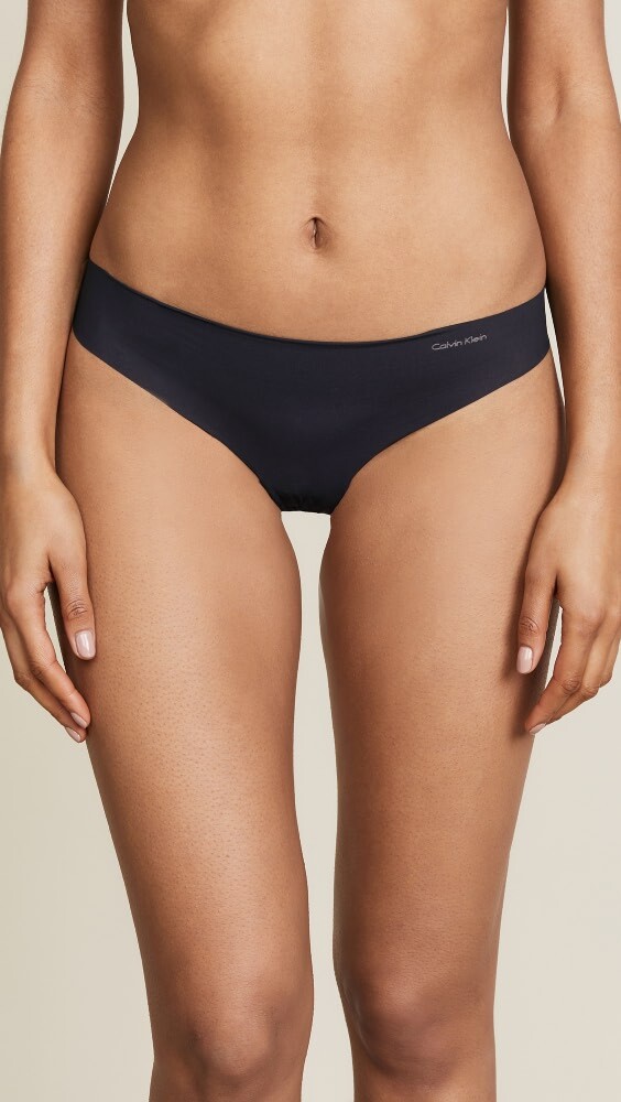 

Стринги Calvin Klein Underwear Invisibles, черный