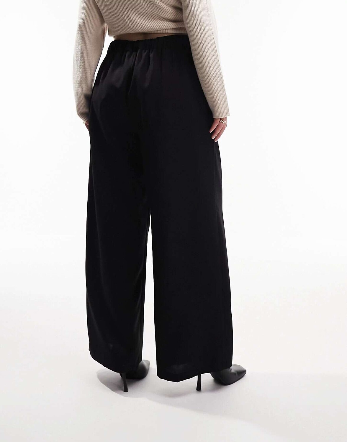 

Черные брюки с эластичной резинкой на талии ASOS Curve, Черный