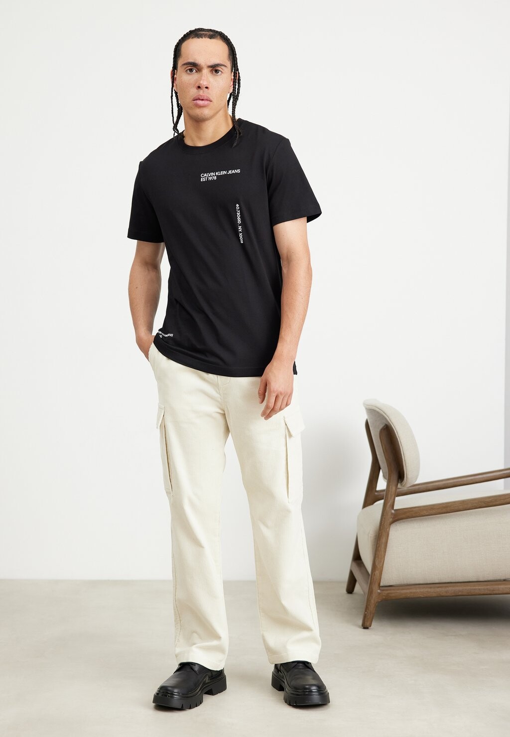 

Футболка с принтом УНИСЕКС Calvin Klein Jeans, черный
