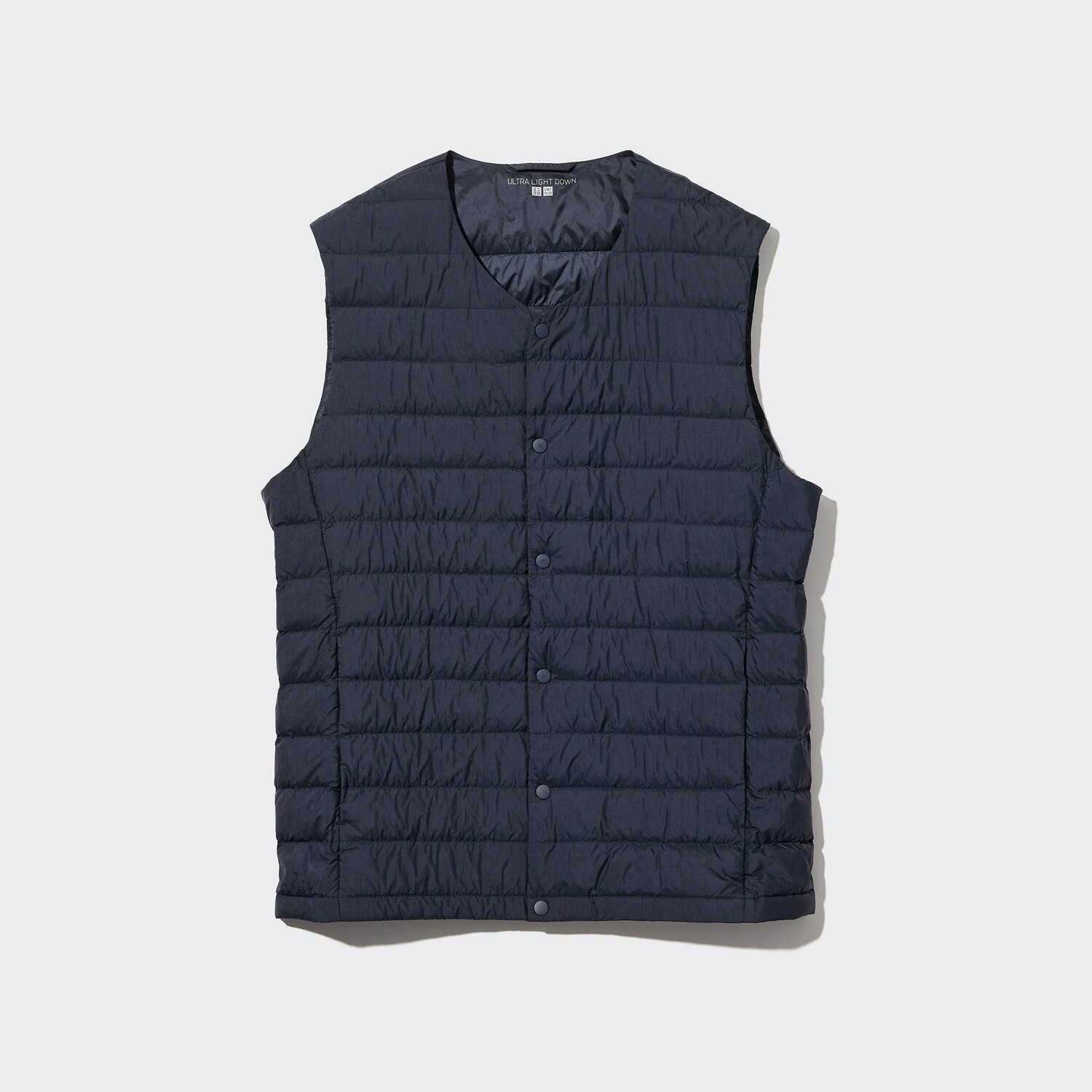 

Пуховик UNIQLO с сумкой, темно-синий