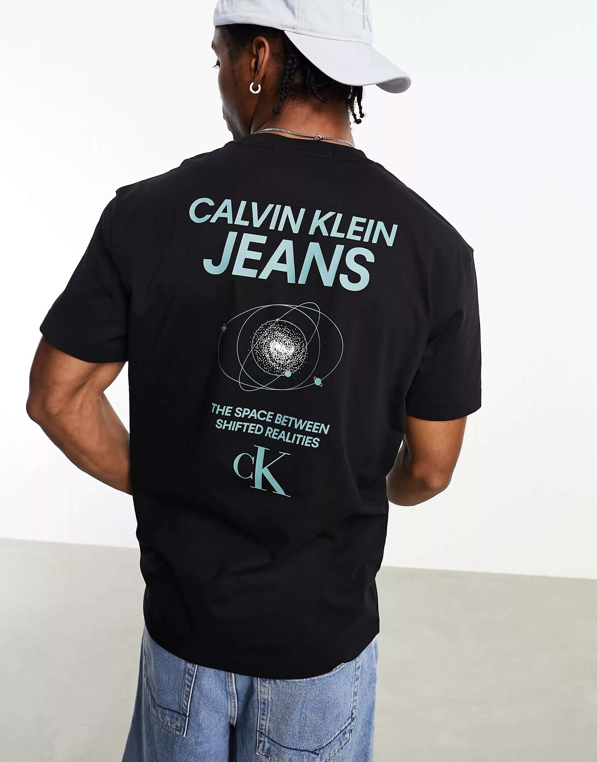 

Черная футболка с рисунком на спине Calvin Klein Jeans Future Galaxy Back, Черный