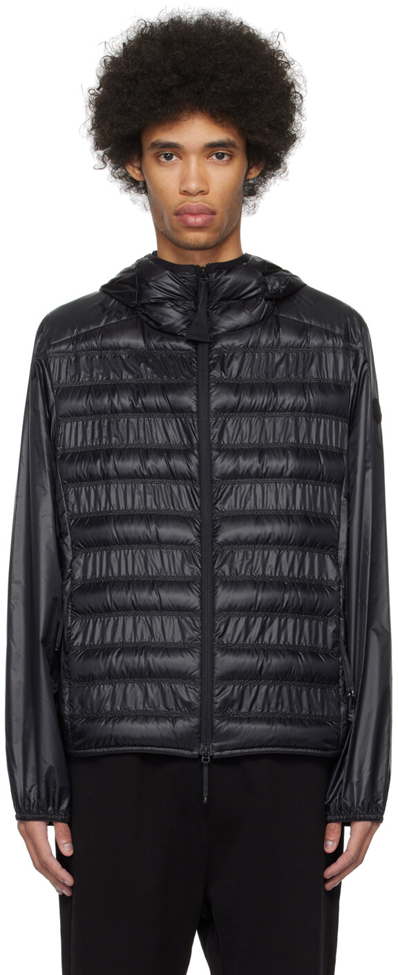 

Черный пуховик Luseney Moncler