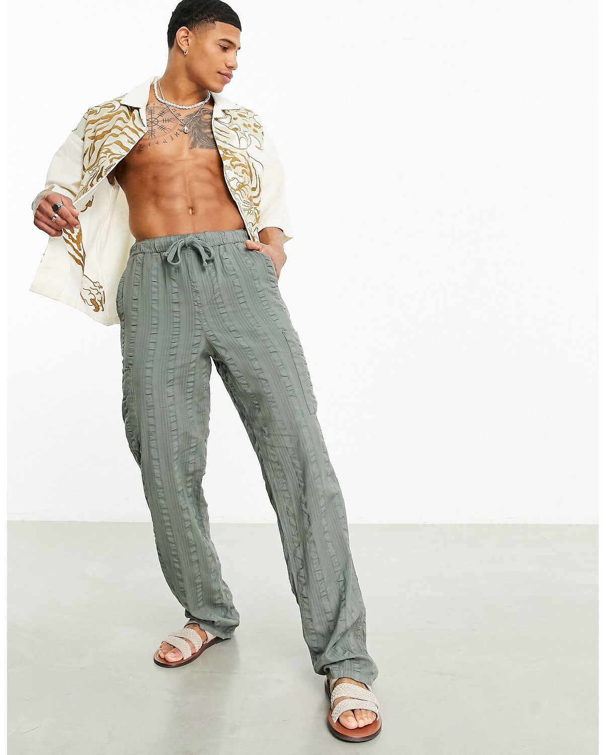 

Зеленые свободные фактурные брюки ASOS DESIGN, Зеленый