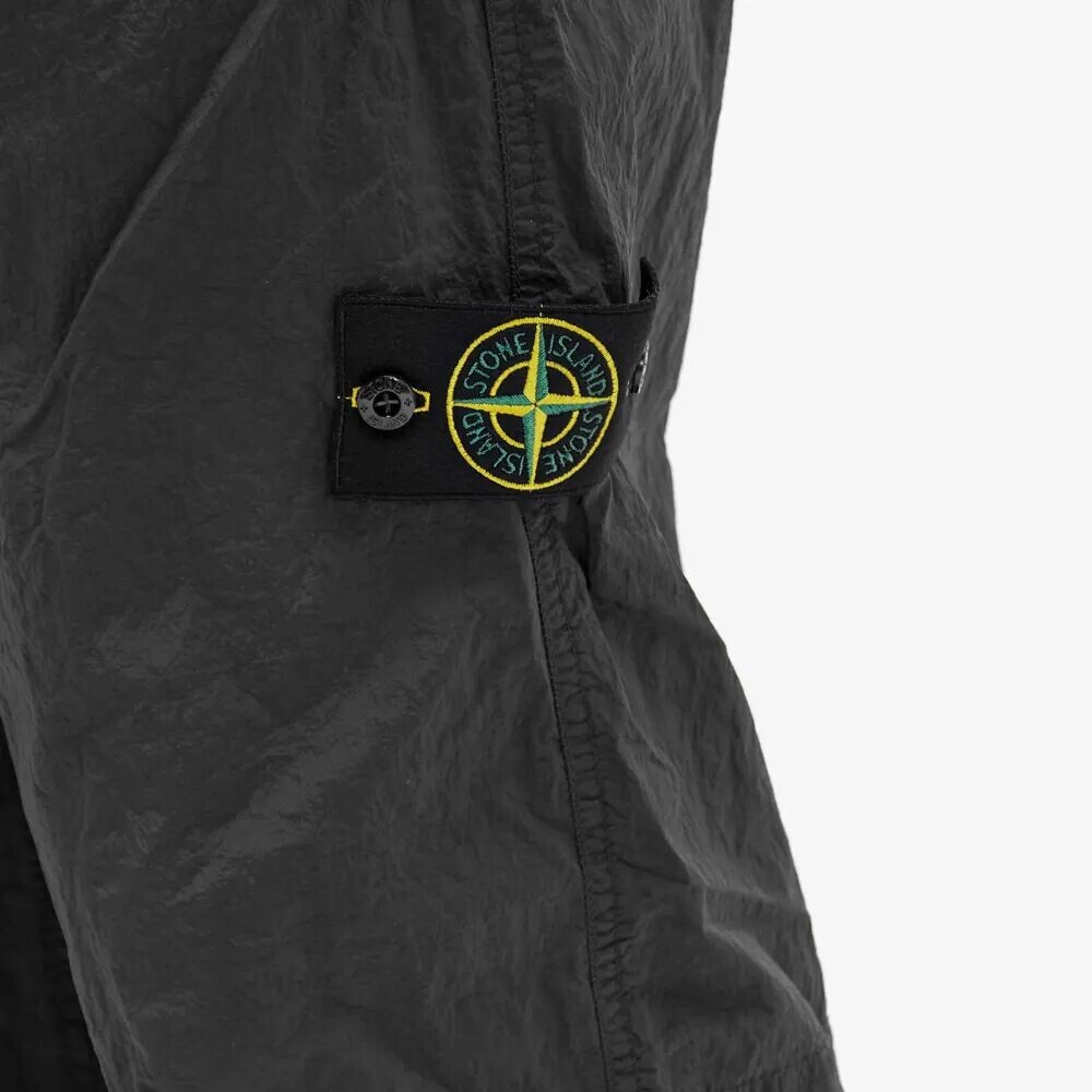 цена Stone Island Брюки из нейлона и металла из эконила, серый