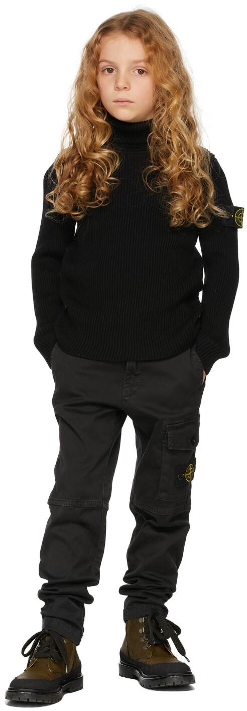 

Детская черная вязаная водолазка в рубчик Stone Island Junior