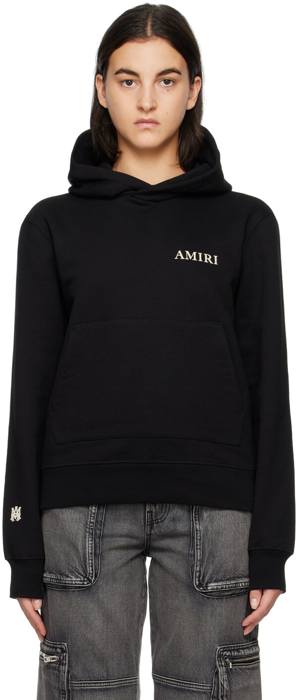 

Черный пуховик с капюшоном AMIRI