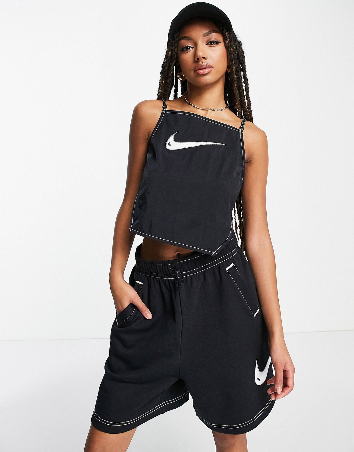 

Черный укороченный топ на бретельках со сборками и рюшами на спине Nike Swoosh