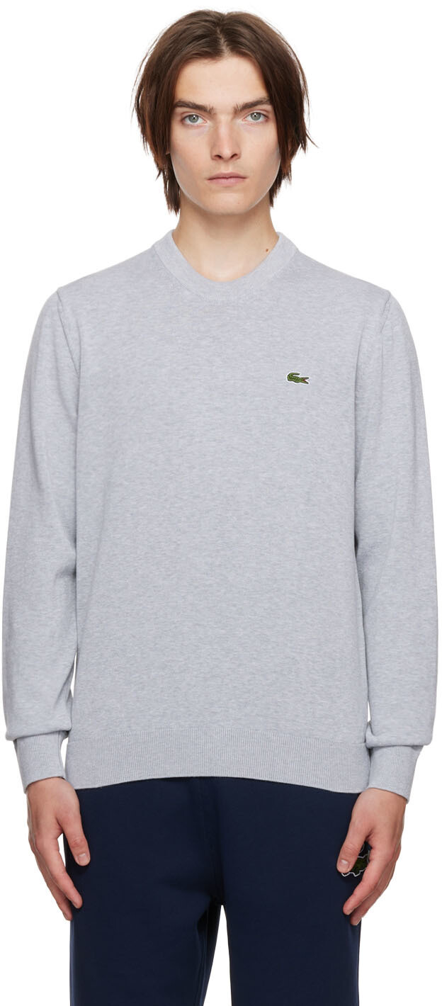 

Серый свитер с нашивками с вышивкой Lacoste