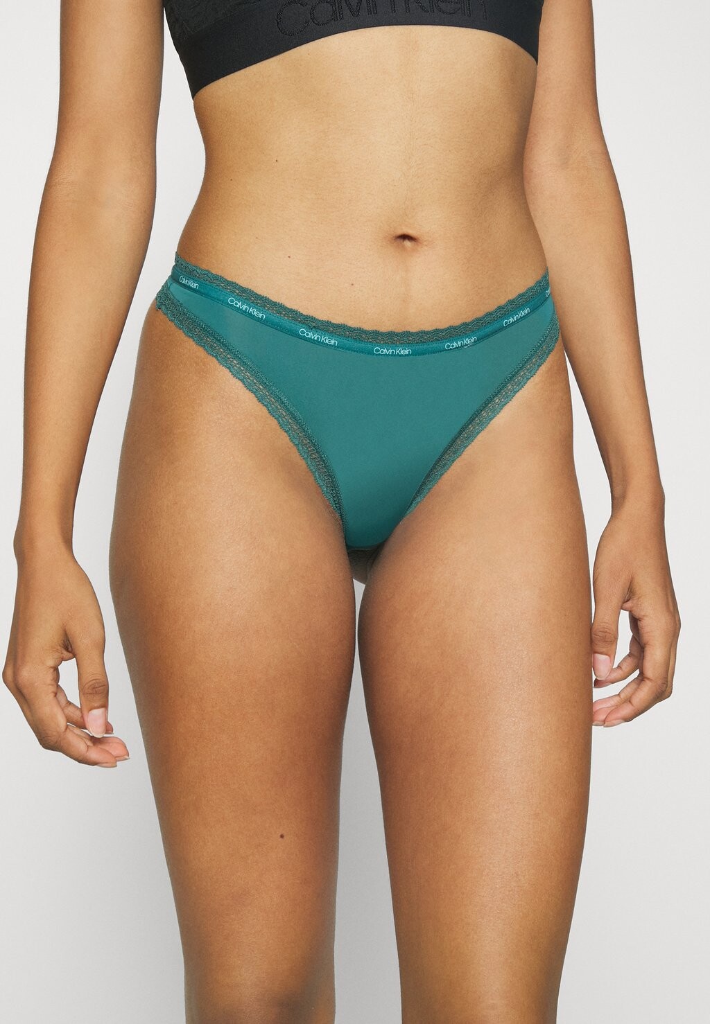 

Стринги THONG Calvin Klein Underwear, темно-зеленый