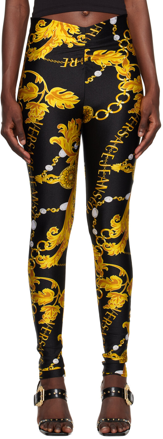 

Черно-золотые леггинсы с цепочкой от кутюр Versace Jeans Couture