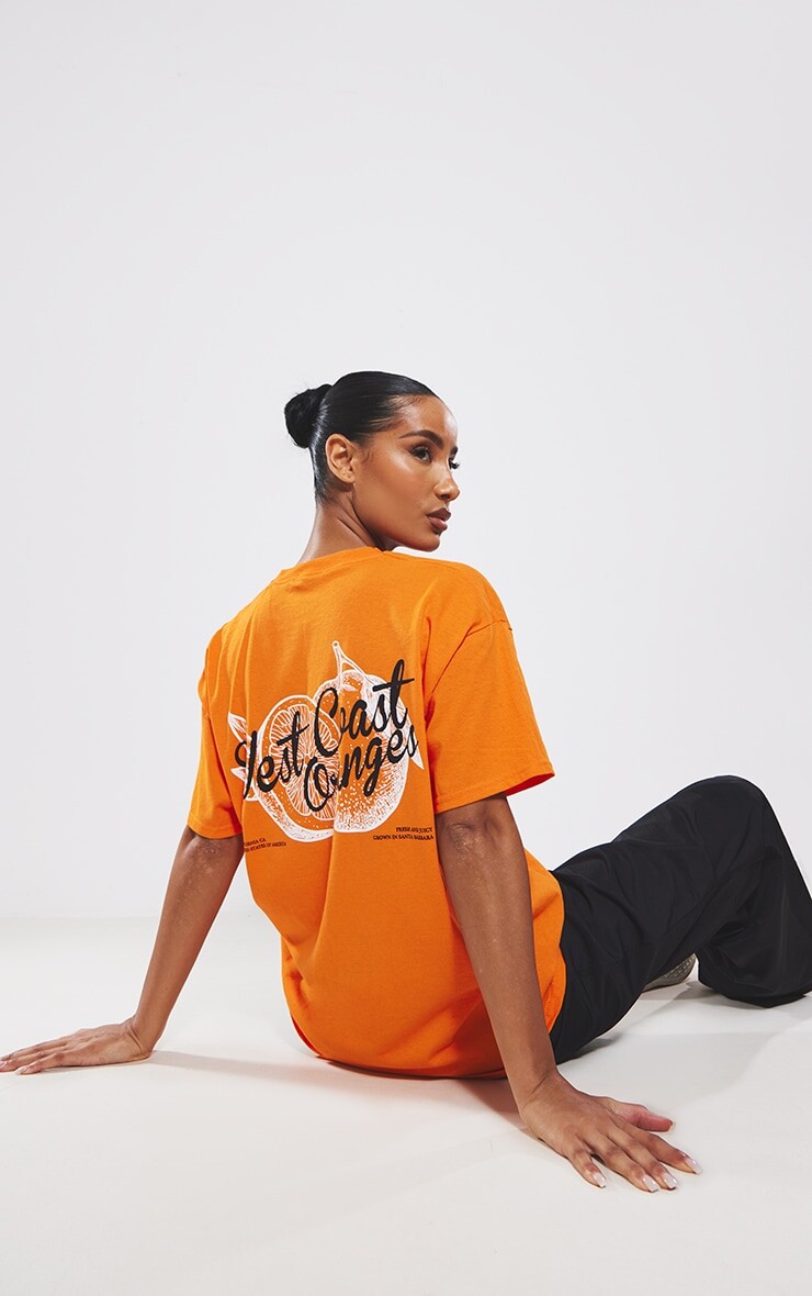 

PrettyLittleThing Оранжевая футболка с принтом на спине West Coast Oranges