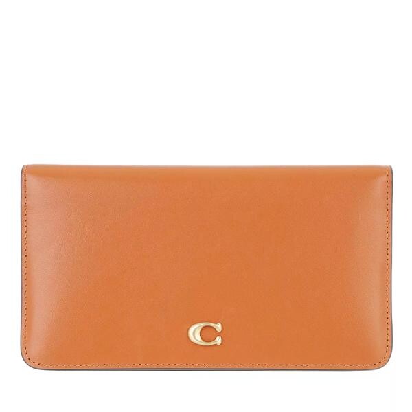 

Кошелек slim wallet Coach, оранжевый