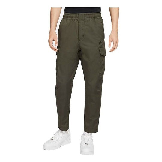 

Спортивные брюки Nike Sportswear Men's Unlined Utility Cargo, темно-зеленый