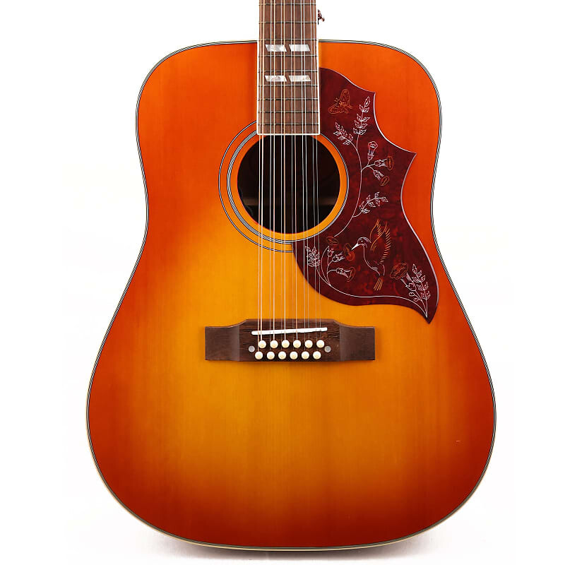 

Epiphone вдохновлен Gibson Hummingbird 12-String Acoustic-Electric Aged Cherry Sunburst Gloss Epiphone Inspired by Gibson Hummingbird 12-String -Electric Gloss
