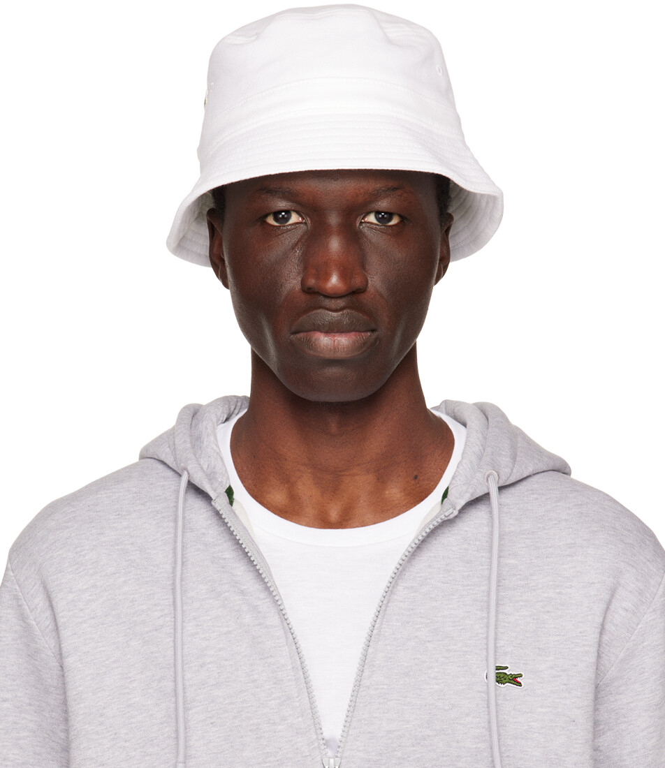 

Белая панама с нашивками Lacoste