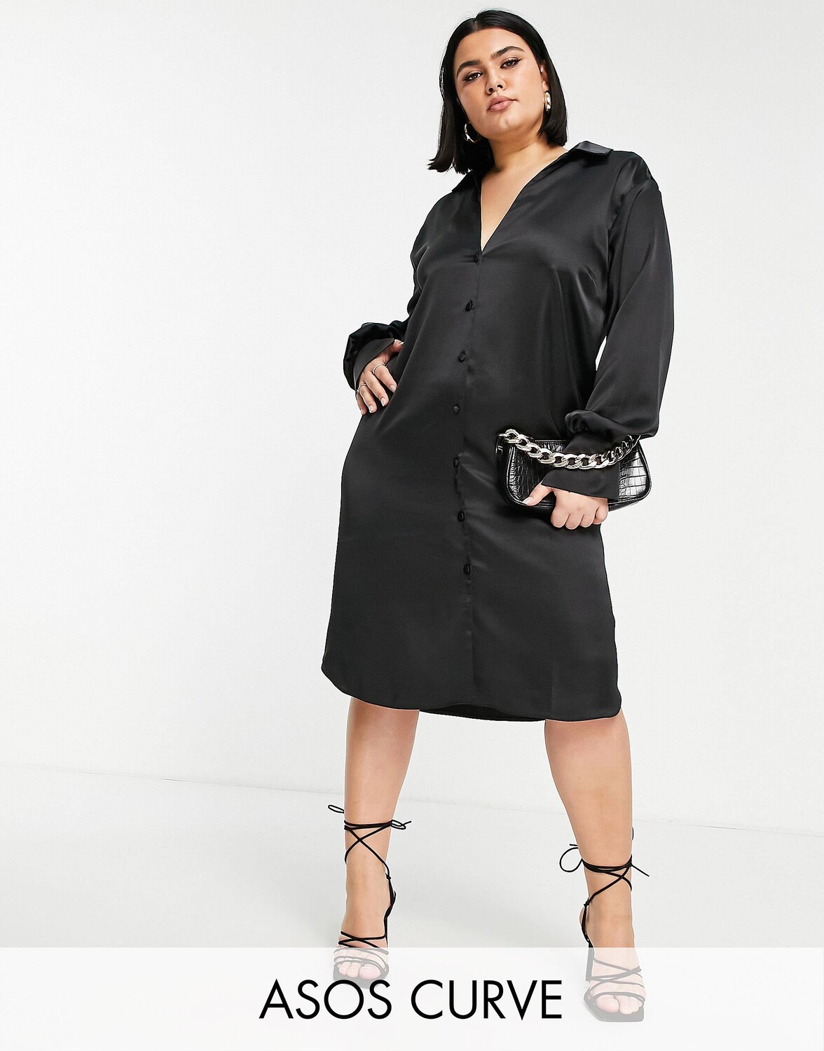 

Черное атласное платье-рубашка миди с глубоким вырезом ASOS DESIGN Curve