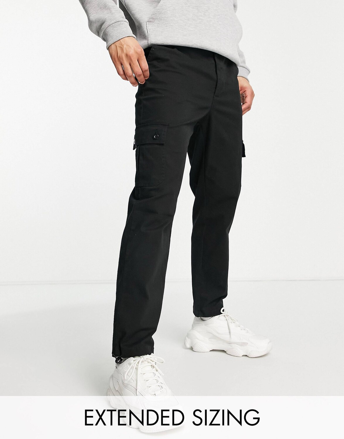 

Черные зауженные брюки карго с пуговицами ASOS DESIGN, Черный