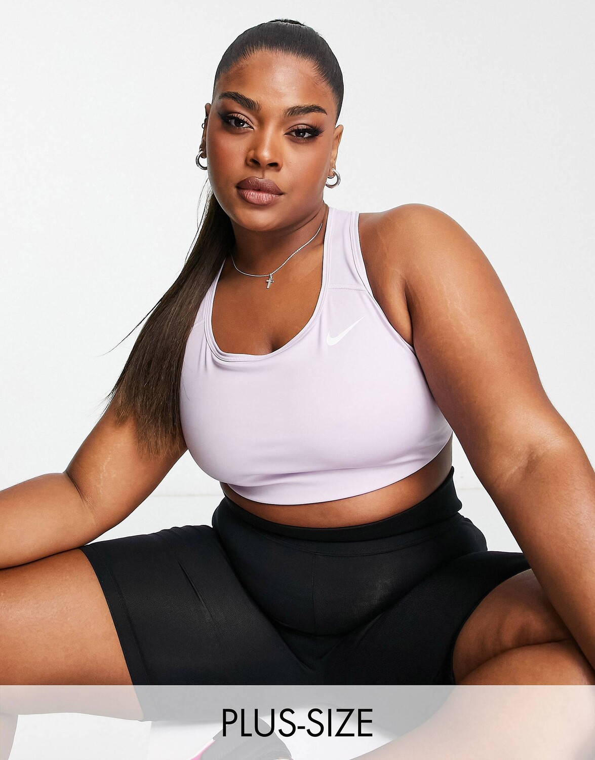 

Розовый спортивный бюстгальтер со средней поддержкой Nike Training Plus Swoosh Dri FIT