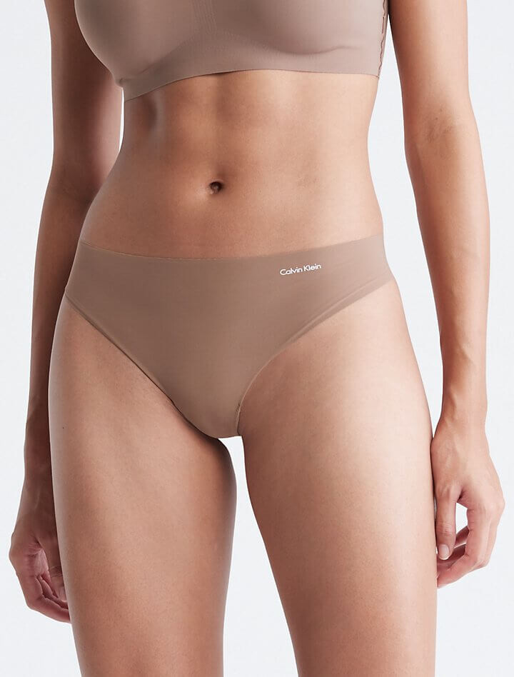 

Стринги Calvin Klein Invisibles, темно-коричневый
