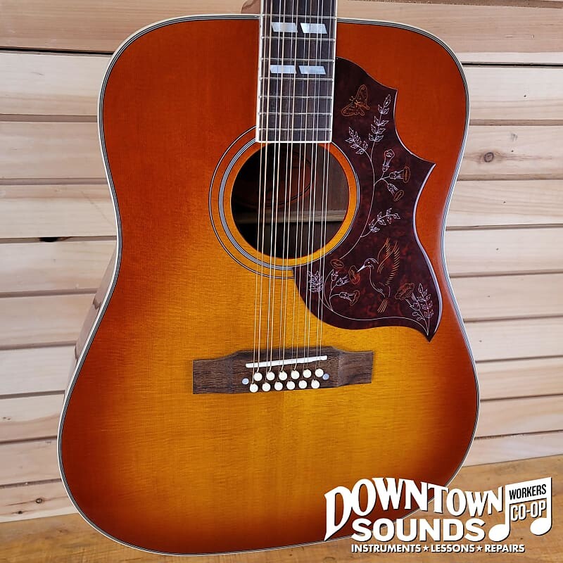 

Epiphone вдохновлен 12-струнной гитарой Gibson Hummingbird — Aged Cherry Sunburst Gloss IBG HUMMINGBIRD 12-STRING - AGED CHERRY SUNBURST