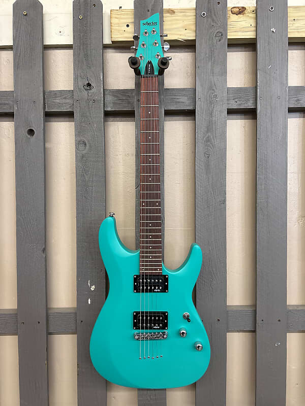 

Schecter C-6 Deluxe Satin Aqua