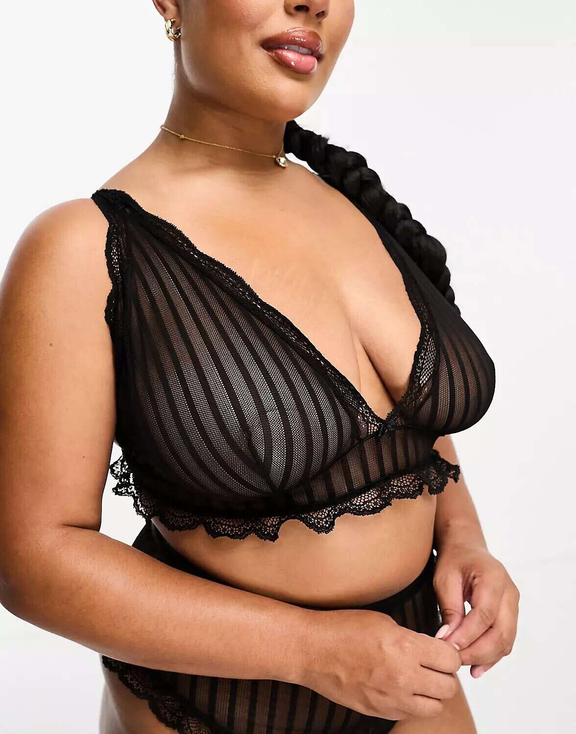 

Черный удлиненный бралетт из ребристой сетки ASOS DESIGN Curve Brooke