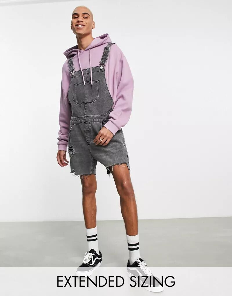 

Короткий джинсовый комбинезон черного цвета с рваными бедрами ASOS