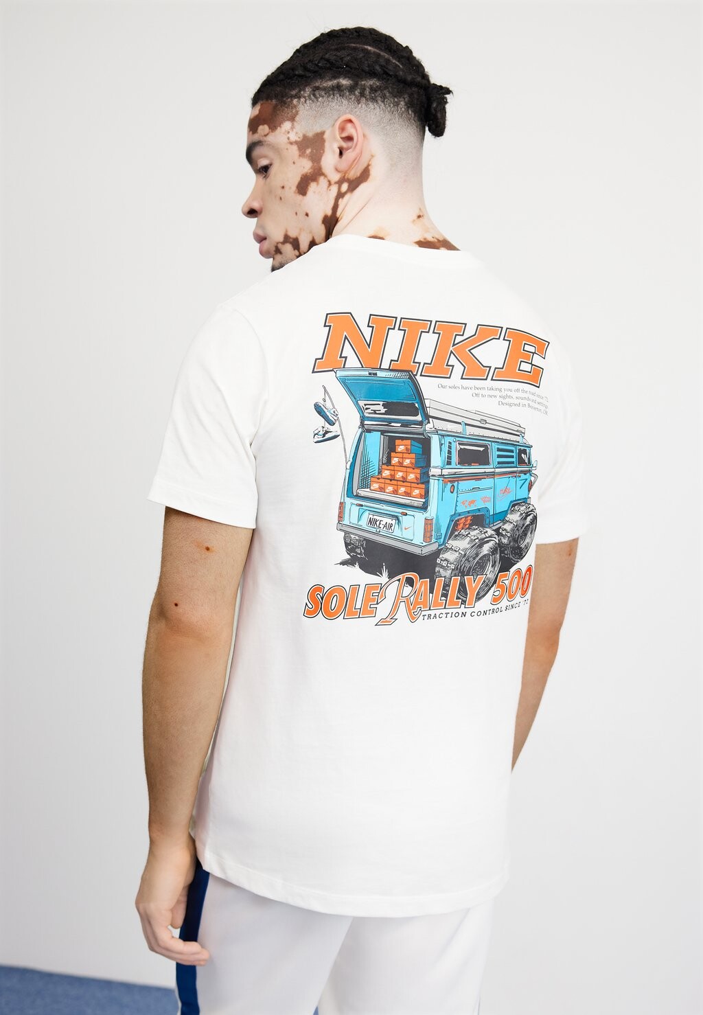 

Футболка с принтом Rally Nike, белый