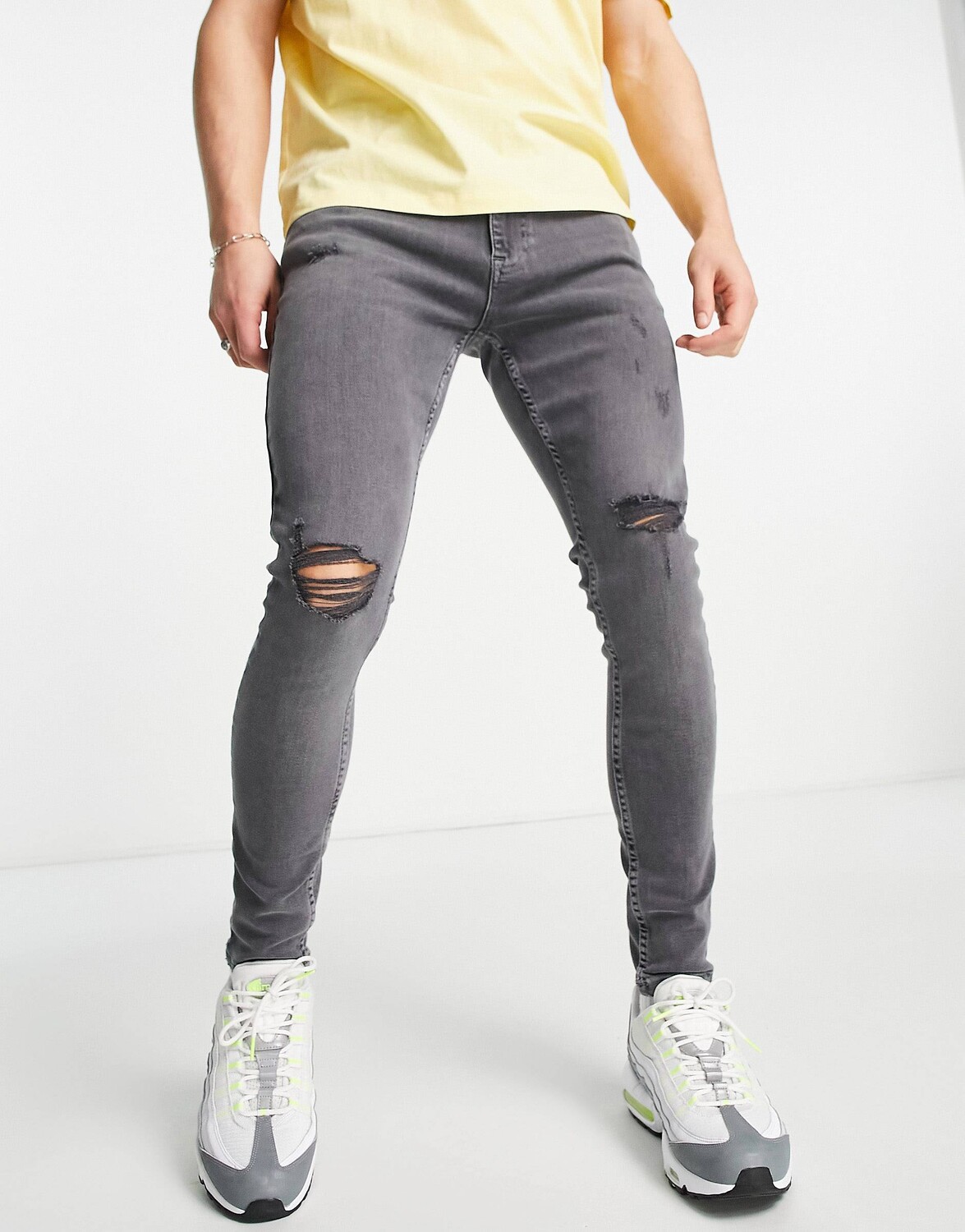 

Супероблегающие зауженные джинсы с эффектом потертости Tommy Jeans Finley