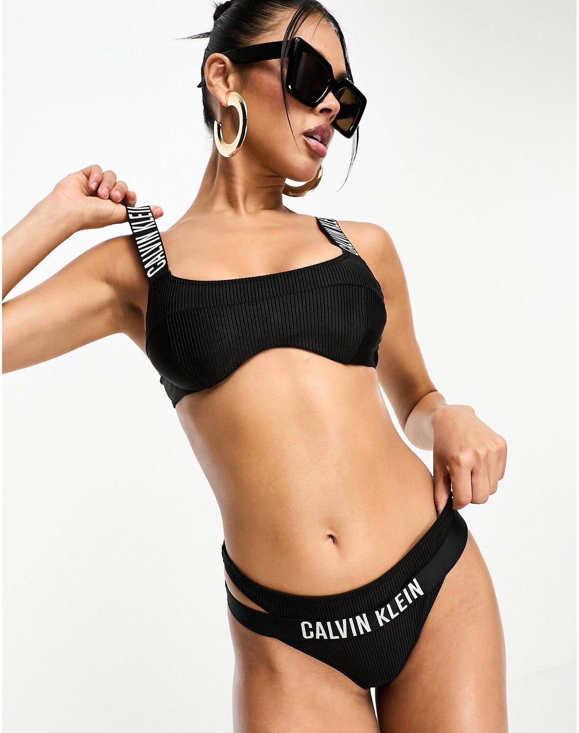 

Черные плавки бикини со стрингами в рубчик Calvin Klein, Черный