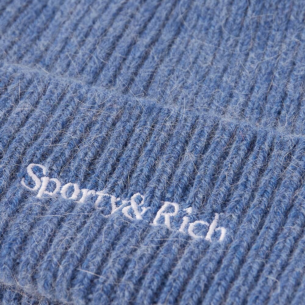

шапка с засечками и логотипом Sporty & Rich