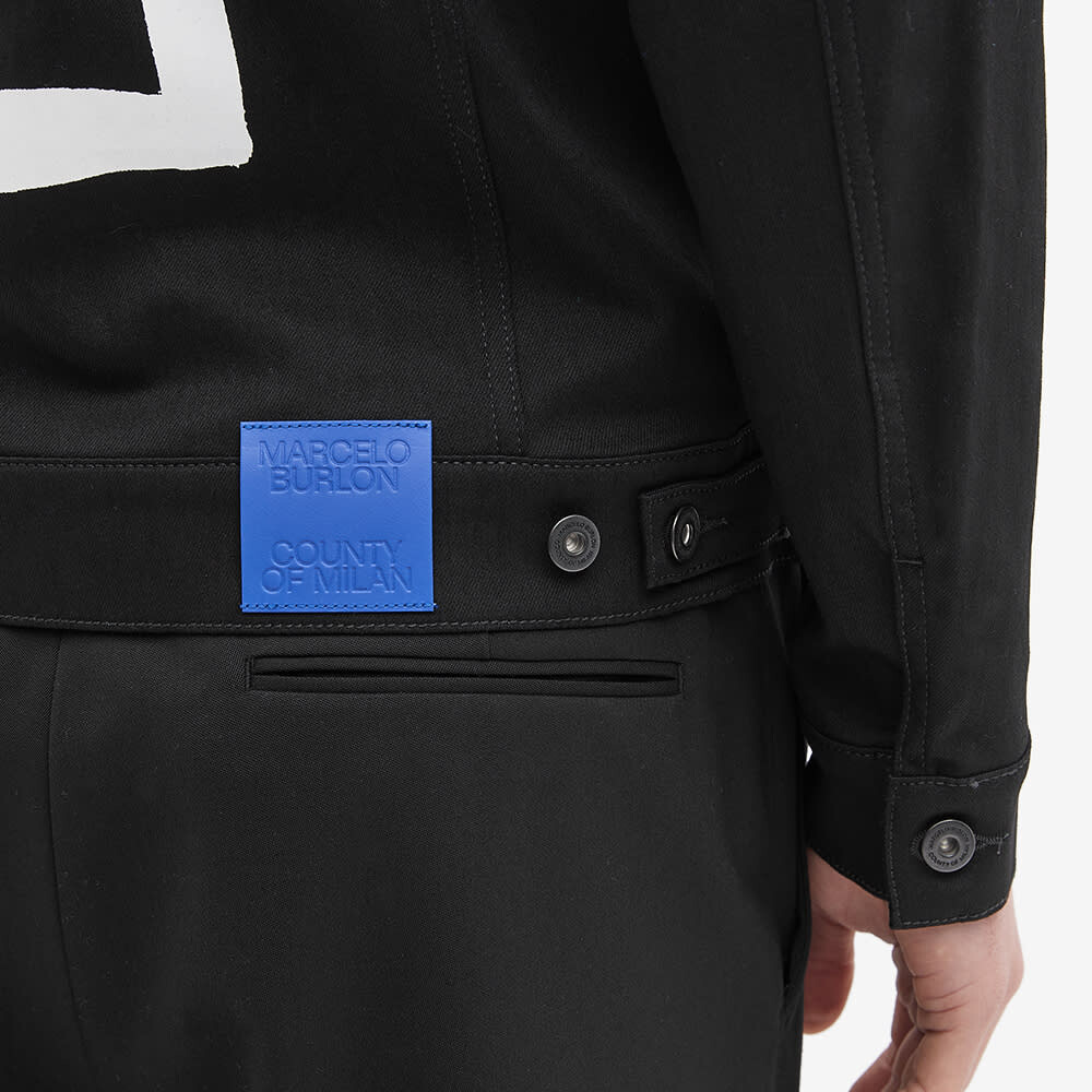

Джинсовая куртка с темперным крестом Marcelo Burlon
