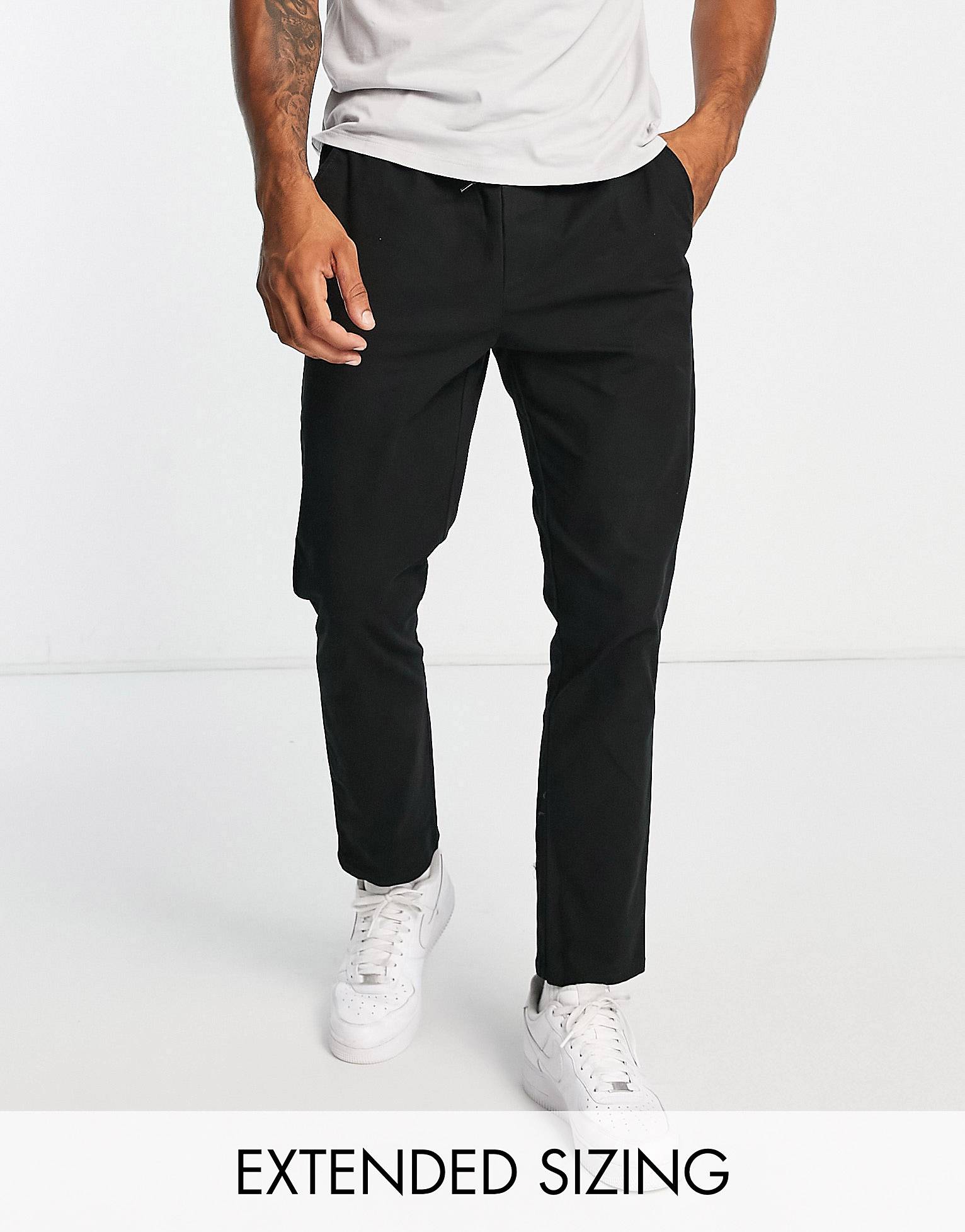 Черные узкие брюки чинос с эластичным поясом ASOS DESIGN