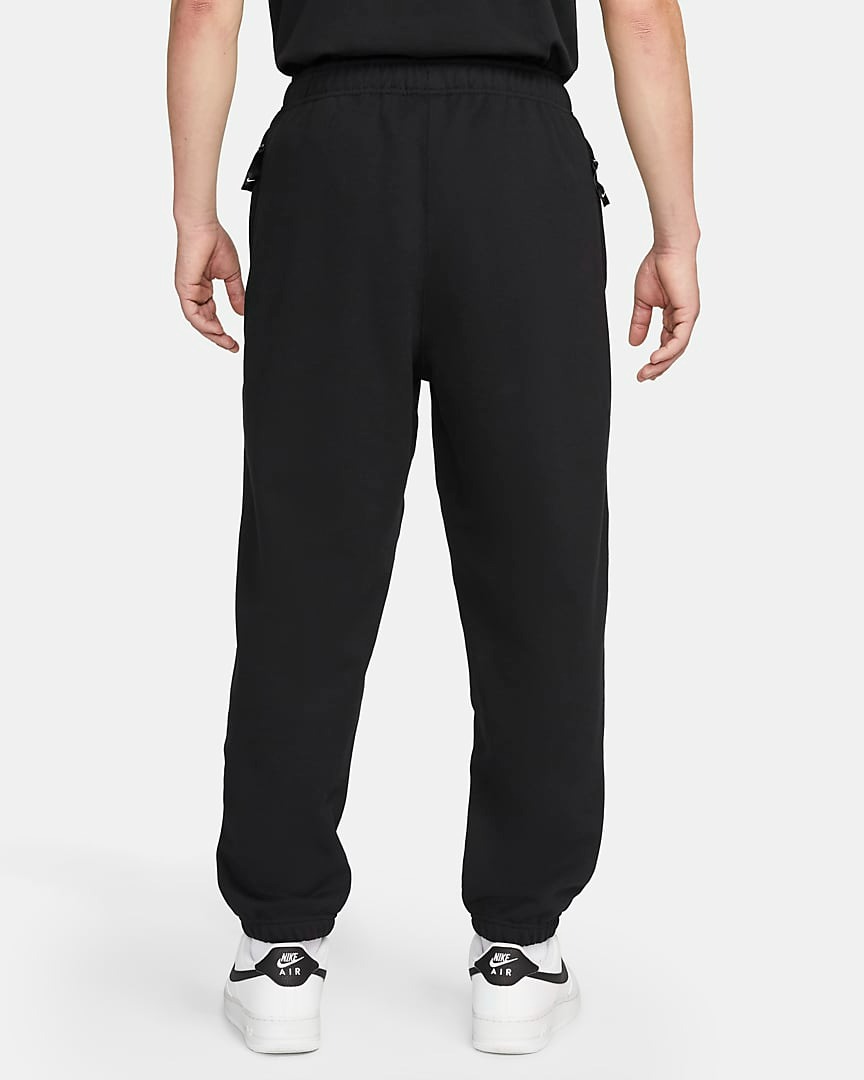 Спортивные брюки Nike Solo Swoosh Men's French Terry, черный – заказать из-за рубежа в «CDEK.Shopping»