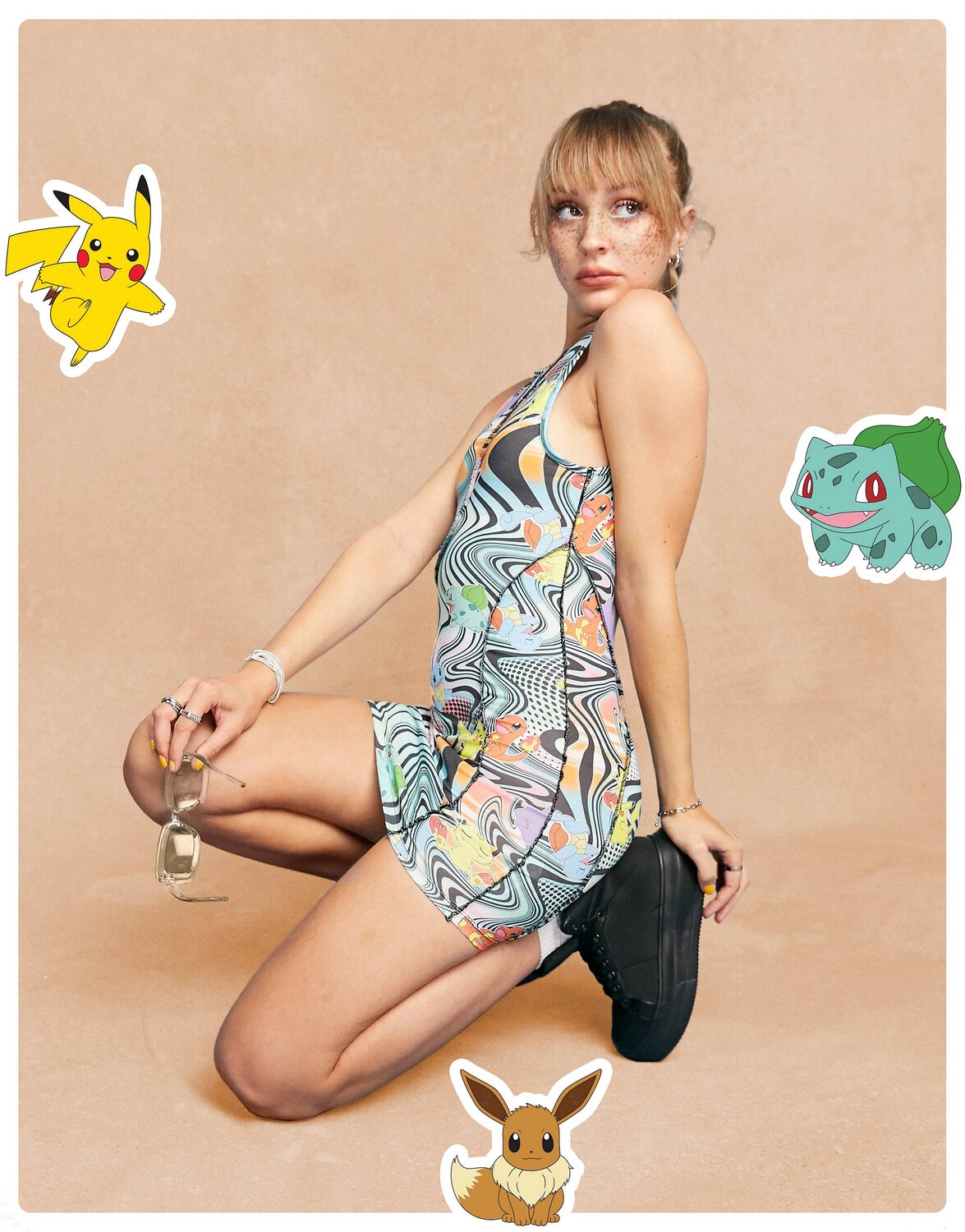

Волнистое облегающее платье мини с графичным принтом ASOS DESIGN Pokemon