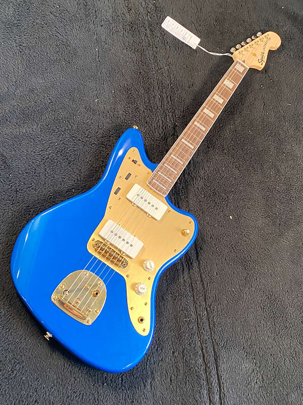 

Squier 40th Anniversary Jazzmaster, Gold Edition, голубой цвет Лейк-Плэсид, 7 фунтов 12,5 унций, #ICSJ21041557 40th Anniversary Jazzmaster, Gold Edition, Lake Placid Blue