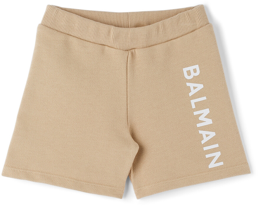 

Детские бежевые шорты-бермуды с боковым логотипом Balmain