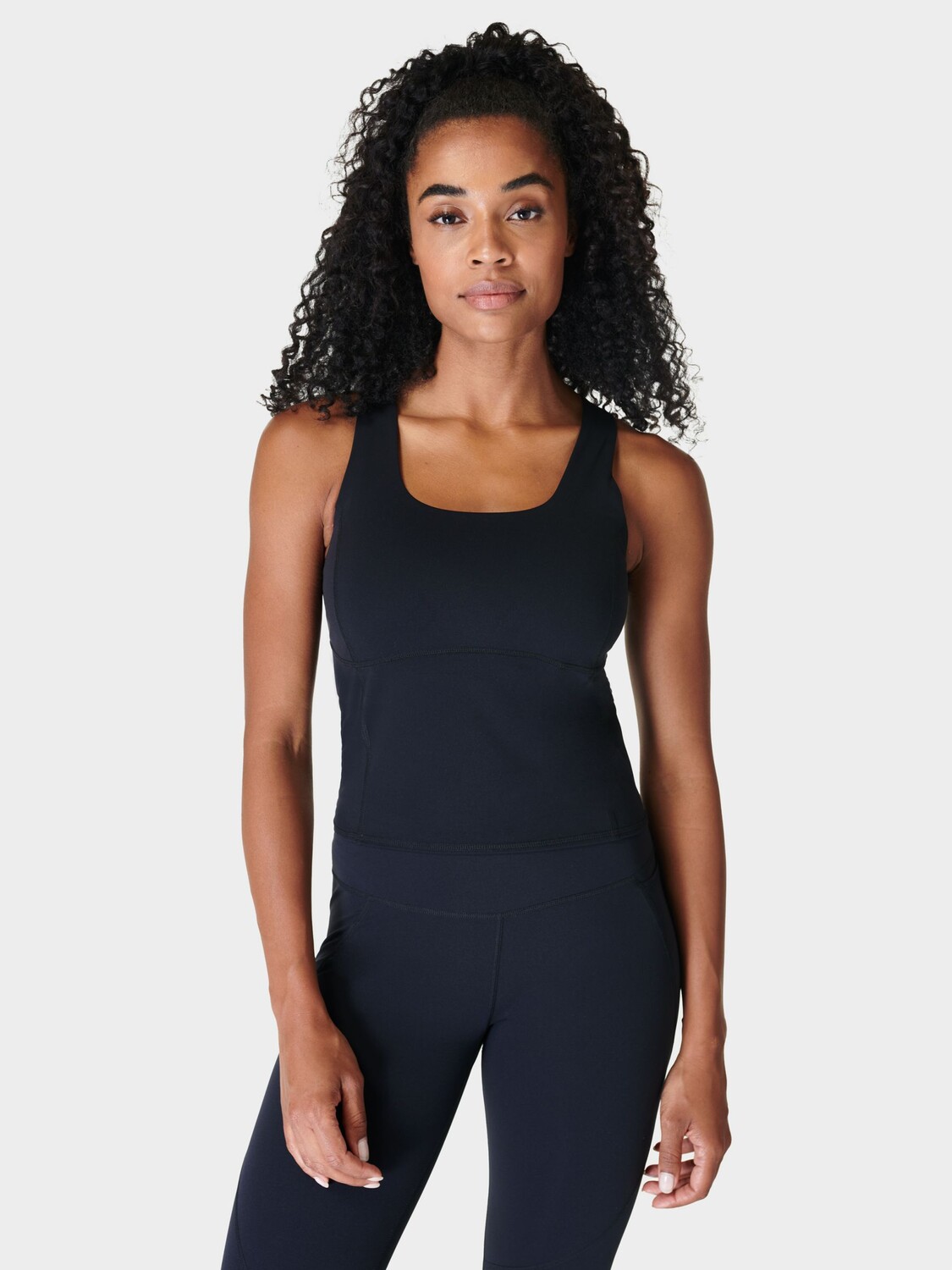 

Топ Sweaty Betty Power с фестонами, черный