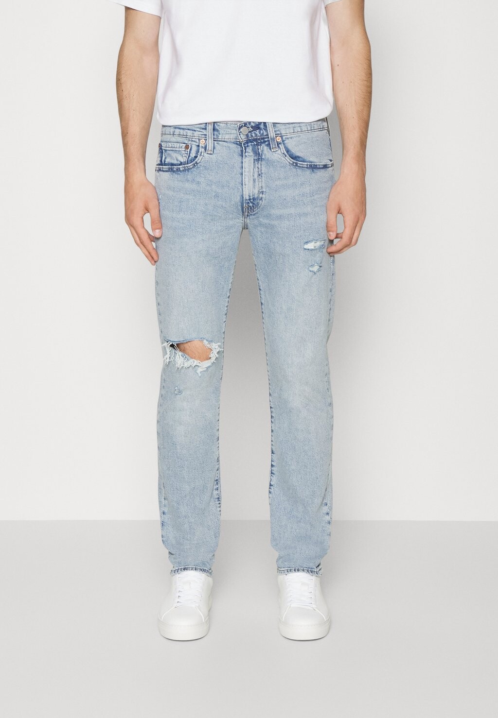 цена Джинсы Tapered Fit 502 TAPER Levi's, цвет fading fast