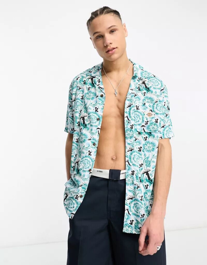 

Синяя рубашка с короткими рукавами и цветочным принтом Dickies Roseburg
