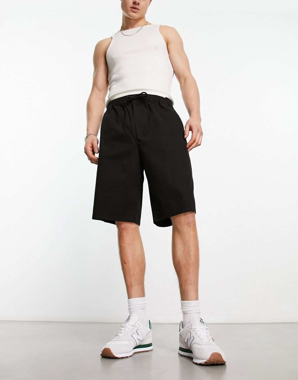 

Длинные черные шорты-чиносы ASOS DESIGN