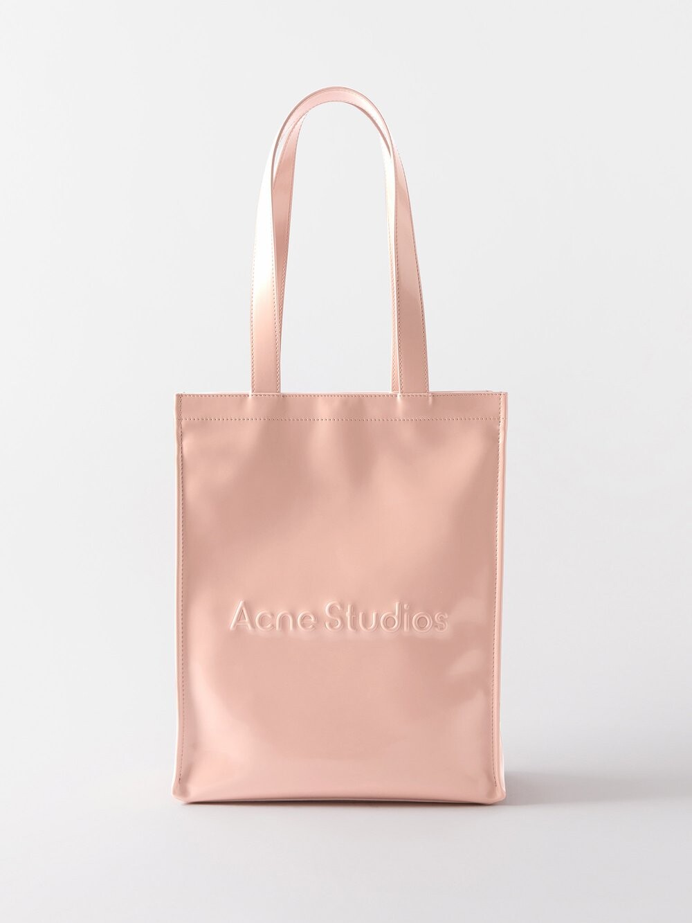 

Резиновая сумка-тоут с тисненым логотипом Acne Studios, розовый