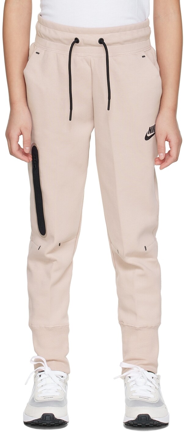 

Детские розовые брюки Sportswear Tech Lounge Nike